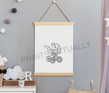Load image into Gallery viewer, Framed illustration of a baby stroller on a gray wall with decorative elements.